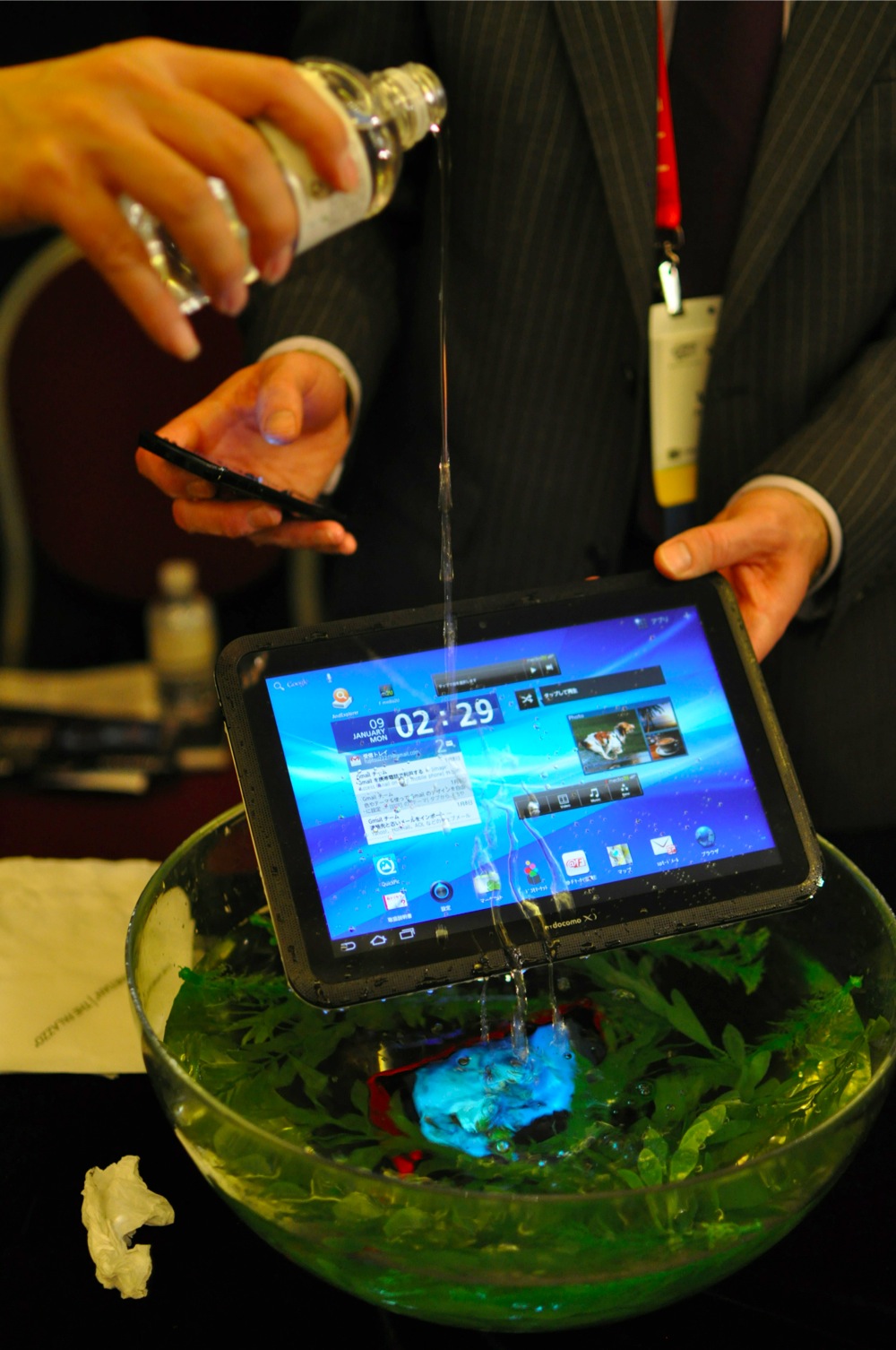 Fujitsu's Waterproof Android Devices Water being poured onto a Fujitsu Tablet